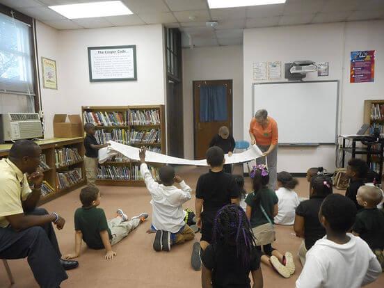 Candid shot of students doing crafts during an author workshop